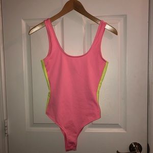 Cute neon pink body suit